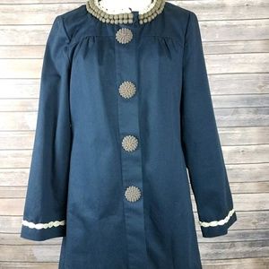 Navy blue Boden trench jacket with neck details.